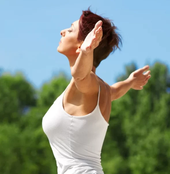 Young healthy woman relaxing outdoors